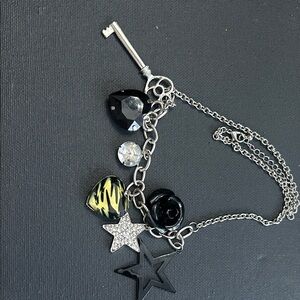 Silver Charm Necklace with Black and Yellow Accents